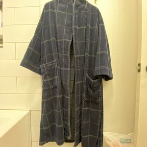 Nautica thick cotton bath robe.  I’m 5’7 and it is past my knees but off floor.